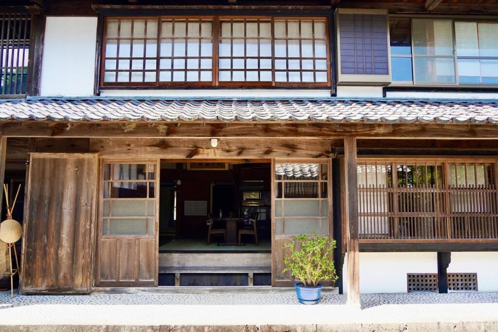 佐渡市佐渡島に残る築130年の伝統的な古民家｜東夢别墅 外观 照片