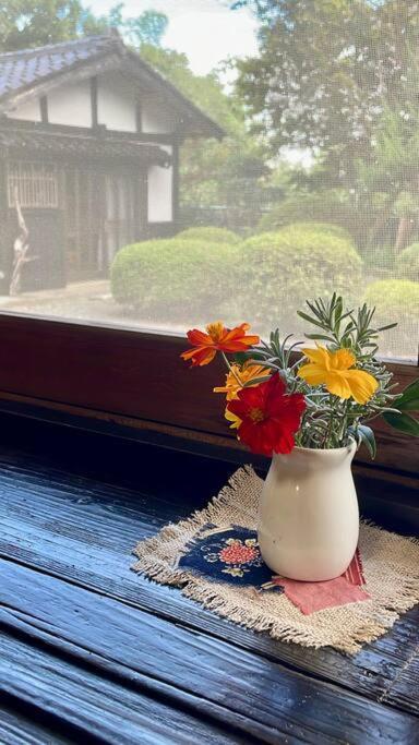 佐渡市佐渡島に残る築130年の伝統的な古民家｜東夢别墅 外观 照片